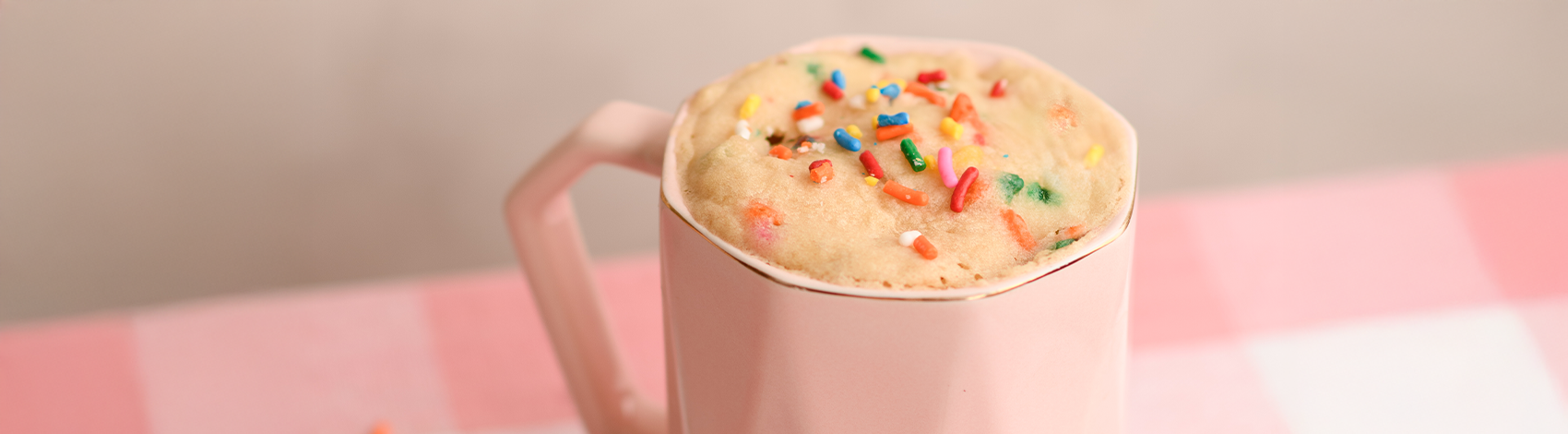 Pastel de vainilla en taza